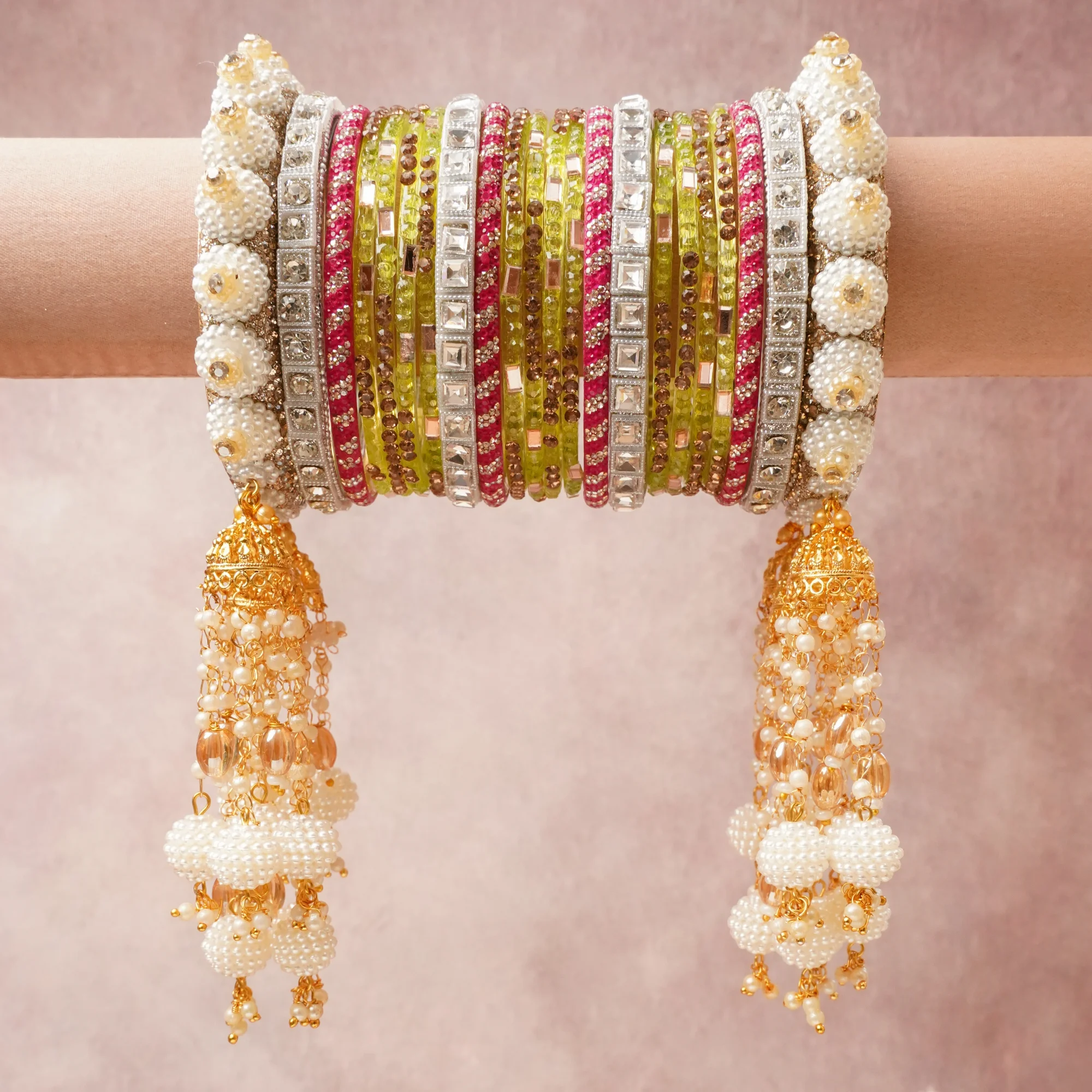 A majestic Lime Green set, complemented by Gold, Clear, Champagne featuring Glass, Simulated Pearl, Gold-toned Metal, Silver-toned Metal, Cubic Zirconia.
Rich, ceremonial, and designed to be passed through generations.